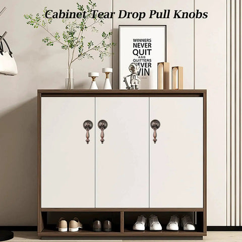 4Pcs Vintage Tear Drop Cabinet Pulls With Screws, Red Bronze Zinc Alloy Handles For Dresser, Closet And Furniture, 2.6 Inch (65mm) Drop Knob Set, shown installed on white cabinet doors.