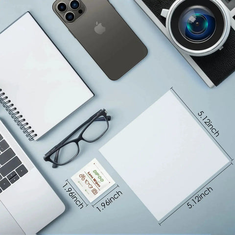 PreMoistened Lens Wipes For Eyeglasses And Camera Lenses Ammonia Free ScratchFree next to eyeglasses, smartphone, and laptop