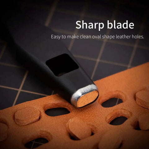 Close-up of Boss Grade Oblong Leather Belt Hole Puncher and Oval Hole Cutter for strap watch bands on leather, flat punch tool.