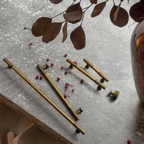 Vintage Antique Brass Zinc Alloy Cabinet Handles With Striped Detailing 128mm Center-To-Center 5.03 Inch Cabinet Pulls displayed on table.