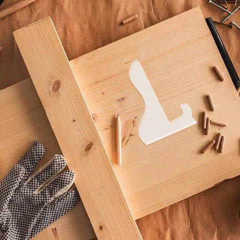 Top view of DIYers Friendly Acrylic Cutting Board And Charcuterie Board Stand Templates With Router Guides And Tracing Stencils For Woodworking placed on wood surface with tools
