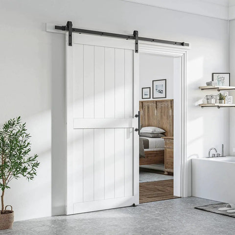 White Primed MDF Sliding Barn Door 40 Inch By 84 Inch With Waterproof PVC Coating in a modern bathroom setting.