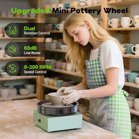 Mini Pottery Wheel Kit With 6 Inch Turntable Two Way Rotation Metal Frame And Removable Splash Tray Includes 18 Piece Sculpting Tools Ceramic Craft Machine Kid Friendly For Beginners used by a woman in a workshop
