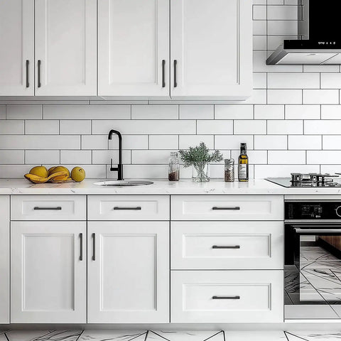 Modern kitchen with white cabinets featuring Black Cabinet Pulls Six And One Quarter Inch Hole Spacing Wide Base Kitchen Cabinet Handles.