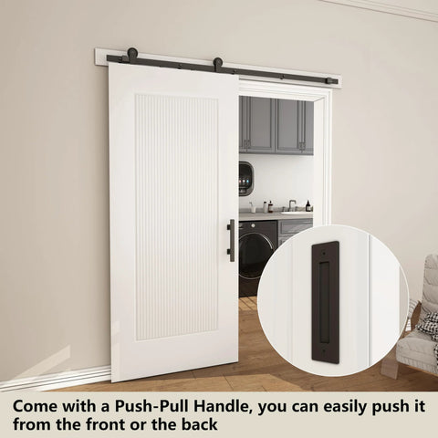 36x84 Reeded White Primed Sliding Barn Door With Matte Black 6ft Hardware Kit installed in living space