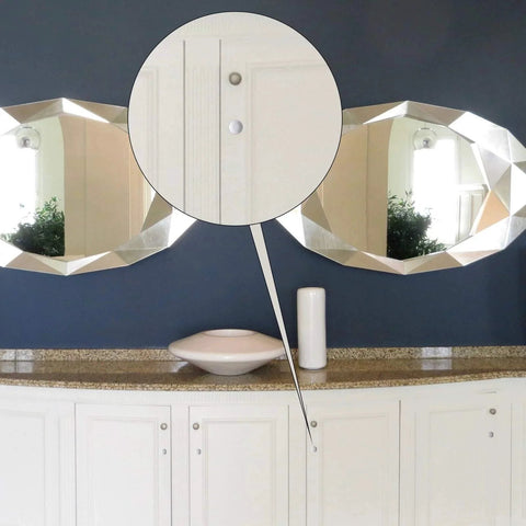 Three Sixteenth Inch Plastic Hole Plugs For Round Holes installed on cabinet near mirrors