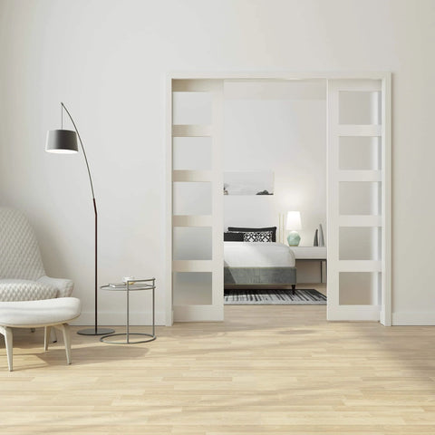 Pocket Door Frame Kit With 220 Lbs Two Way Soft Close For Double Doors 48 To 72 Inches Wide And 80 Inches High DIY Friendly Easy To Install Hidden Door System That Closes Smoothly And Quietly installed in modern living room.