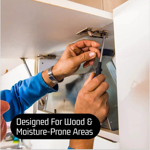 Person installing cabinet hinge using Three Eighths Inch By One And One Half Inch Stainless Steel Lag Screws With Hex Head For Wood 304 Stainless