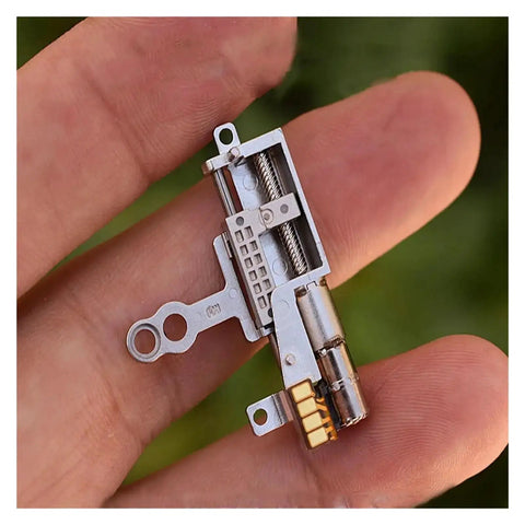 Close-up of 11.5mm Stroke Linear Actuator with 5mm Planetary Gearbox, shown on hand for scale; ideal for robotics and DIY projects