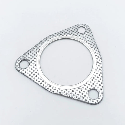 Silver triangular exhaust gasket with three bolt holes and large central bore, metal perforated surface