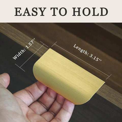 Close-up of gold adhesive edge finger pull with dimensions, part of Gold Adhesive Edge Finger Pulls For Cabinets 5 Pack With Screws And Tape.