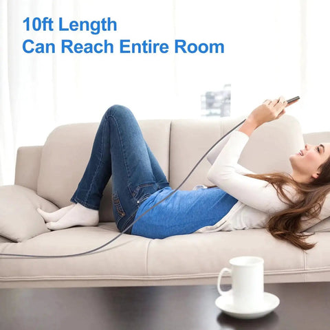 Person lounging on a sofa using a 10ft USB-C braided cable for fast charging an Android phone, demonstrating reach across the room.