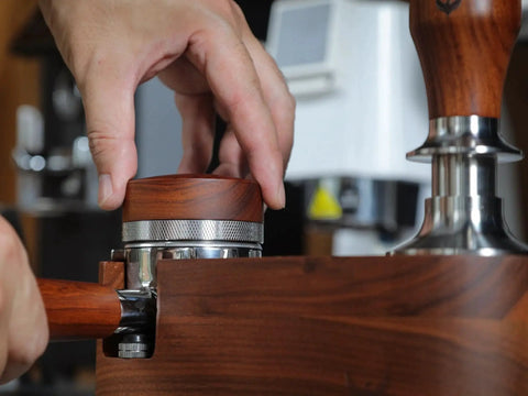 KNODOS 54mm espresso distribution tool with rosewood knob and stainless steel body, adjustable leveler