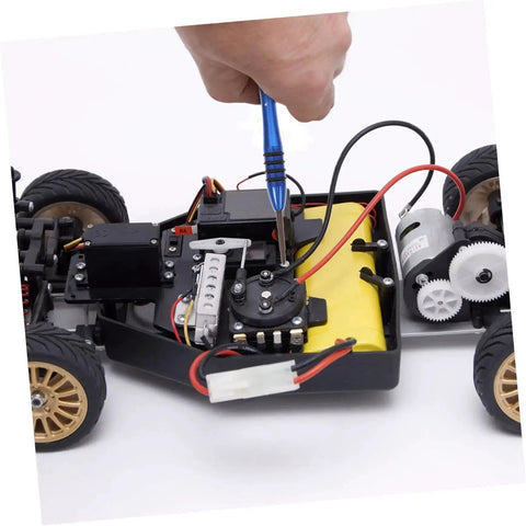 Person using Must-Have RC Car Screw And Bolt Kit For Quick Repairs And Routine Maintenance With Wrench Included on RC car frame.