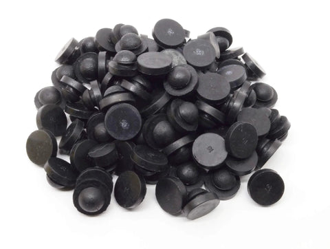 Pile of black Push In Ridged SBR Rubber Bumper Foot, 9/16 Inch Diameter, 1/8 Inch Height, designed for surface protection.