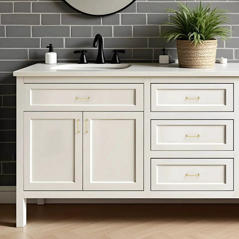 White cabinet with Brushed Brass Cabinet Handles 15 Pack With Three And Three Quarters Inch Hole Center And Four And Three Eighths Inch Overall Length.