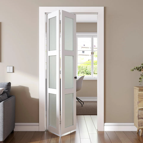 Bifold Closet Door For 24x80 Opening With Tempered Frosted Glass Folding Barn Door Kit installed in room, white finish