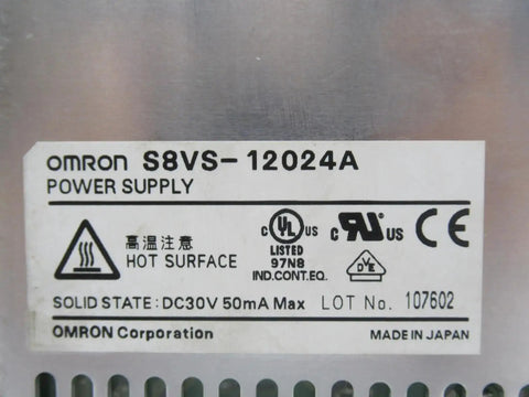 Close-up of Omron S8VS-12024A DIN rail power supply label with safety and certification markings, indicating solid state design.