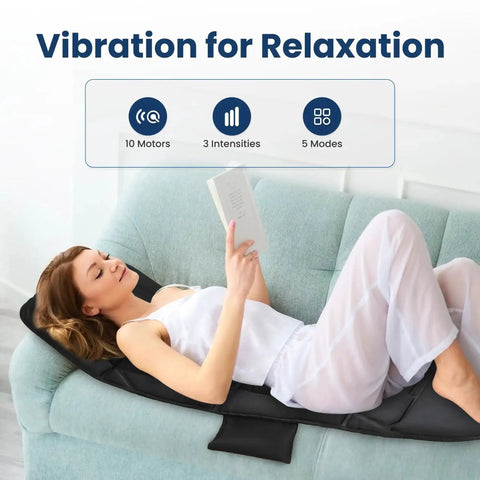 Woman relaxing on Full Body Massage Mat With Heat And Vibration Ten Motors Four Heating Zones 30 Minute Auto Shut Off Foldable Relaxation Pad