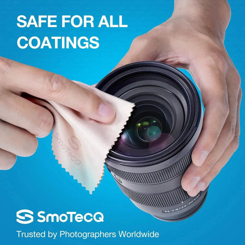 Person cleaning camera lens with 12 Pack Ultra Soft Microfiber Lens Cloths For Glasses Screens Cameras, close-up view.