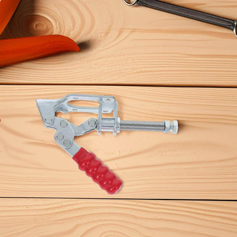 Side view of a galvanized steel toggle clamp with red handle on wooden surface. 4 Pack Beefed Up Heavy Duty Toggle Clamps With Push Pull Action Quick Release Welding And Woodworking Clamps Galvanized Steel Workholding Fixtures Built To Last Stable Grip For Metal And Wood Projects.