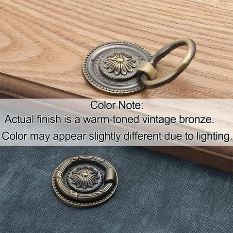 Vintage Oil Rubbed Bronze Ring Pulls for Cabinets and Drawers, 2 Inch Diameter, shown on wood surface and textile background