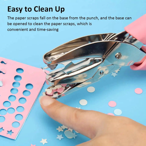 3 Piece Metal Handheld Paper Punch Set With Circle Star Heart Shapes in use on a blue paper, showing confetti and easy clean-up feature.