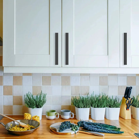10 Pack 5 Inch Matte Black Cabinet Pulls for Cupboards and Drawers installed on white kitchen cabinets.