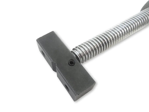 Close-up of adjustable inline bench dog screw clamp for three quarter inch holes with full five inch travel, ideal for woodworking.