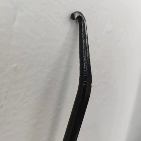Close-up of a metal Exhaust Spring Hook T Shaped Handle For Motorcycle Rubber Coated Set Of 2, showing the hook's tip.