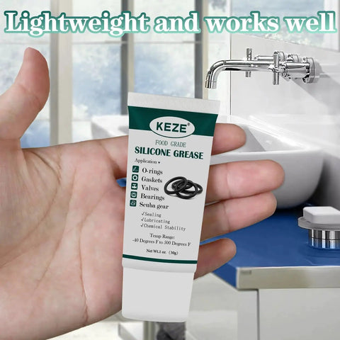 Food Grade Silicone Lubricant For Faucets Valves O Rings Plumbers Grease 1 Oz tube in hand near kitchen sink.