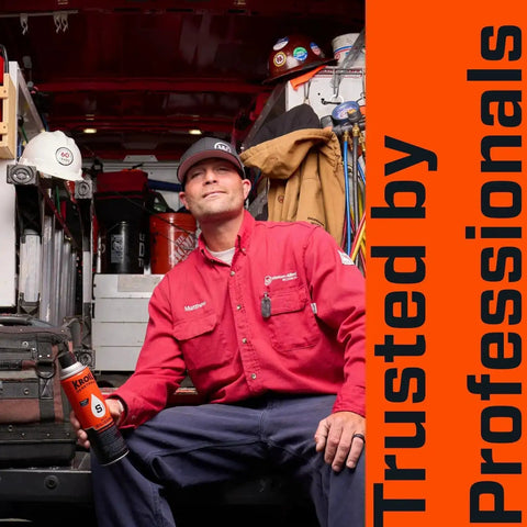 Technician holding Rust Busting Penetrant With Silicone For Major Rust in 10 oz aerosol spray inside a work van, text "Trusted by Professionals."