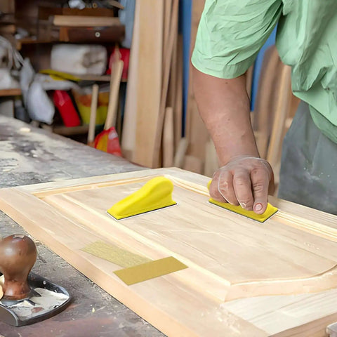 Person using Micro Detail Sander Kit With 60 Assorted Sandpapers on wooden panel in workshop