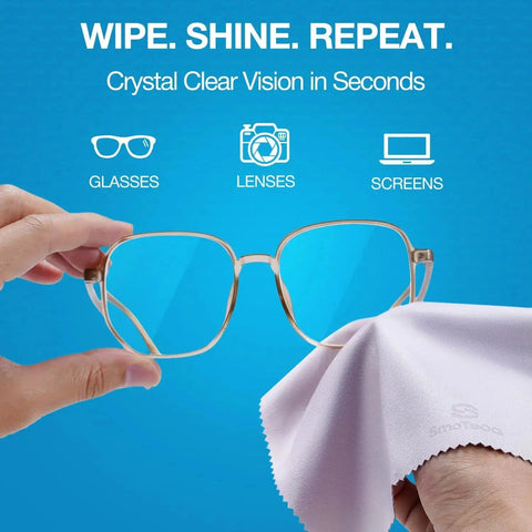 Hands cleaning glasses with 12 Pack Ultra Soft Microfiber Lens Cloths For Glasses Screens Cameras on blue background.