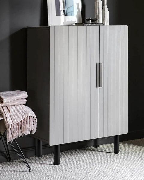 4 Pack 6 Inch Metal Cylinder Furniture Legs with M8 Screws Black Finish installed on modern cabinet