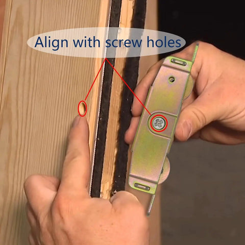 Installing sliding patio door rollers replacement hardware on a wood frame, aligning with screw holes for secure attachment.