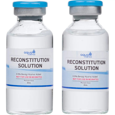 Two Pack 30ml Reconstitution Solution With Premium Glass Vials Made In USA For Ultra Clean Deionized Water Based Formula Ready To Use In Labs Clinics Or Home Reconstitution bottles with blue caps.