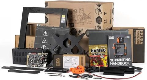 MK4S 3D Printer Kit with Automatic Calibration and Removable Sheets components, including parts and printed handbook, for DIY setup.