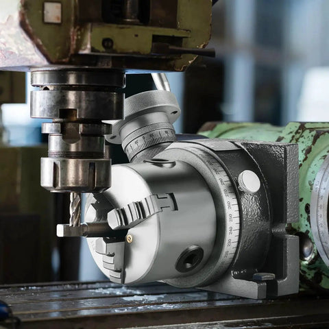 4 Inch Milling Rotary Table For Milling Machines Horizontal And Vertical Precision Indexing With 3 Jaw Chuck 80 Mm M10 T Bolts Nuts Includes 3.1 Inch Clamping Range For Small Shop Wood And Metal Workpieces shown installed on a milling machine.