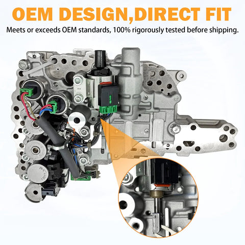 CVT transmission valve body assembly with step motor, silver metal housing and green electrical connectors, close-up view