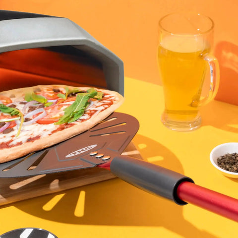 Pro Grade 9 Inch Perforated Pizza Peel With Extendable 27 To 41 Inch Handle For Indoor And Outdoor Ovens, Lightweight Aluminum Turning Peel, Nonstick Metal Pizza Turner Red TKC sliding pizza into oven