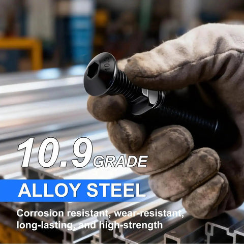 Gloved hand holding M3 M4 M5 T Slot Nut Screws Kit 260 Pcs, showcasing 10.9 grade alloy steel for 2020 series aluminum profile.