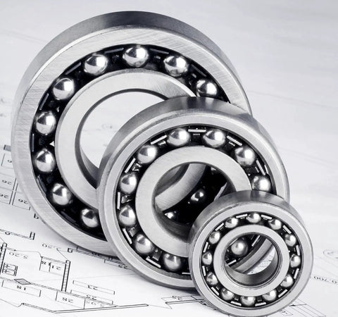 Close-up of three R4 2RS ball bearings for motors and wheels, featuring heavy-duty pro grade construction, ideal for bikes and pumps.