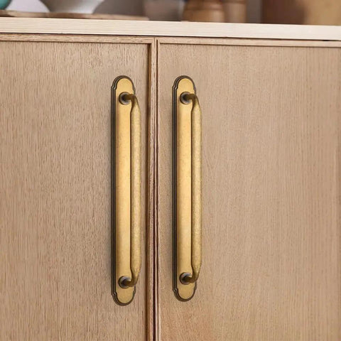 Antique Brass Zinc Alloy Cabinet Handle With Backplate 7.56 Inch Center To Center 192mm 2 Pack installed on wooden cabinet