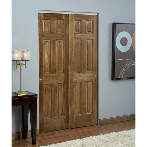 Twin Wheel Bypass Sliding Door Hardware Kit For Doors 1 3 8 Inch Thick, 75 Pound Capacity, installed on wooden closet doors.
