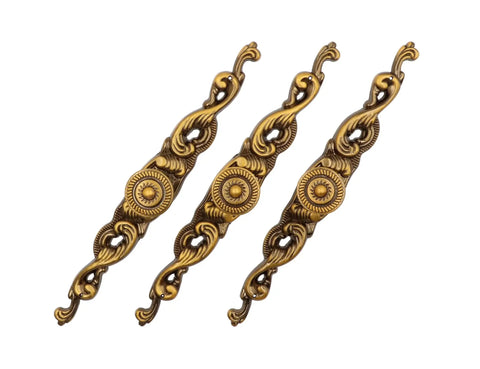 Three vintage style cabinet knobs and pulls in yellow bronze, featuring ornate back plates. 3 Piece Set Zinc Alloy Yellow Bronze Back Plate Pull Handles.