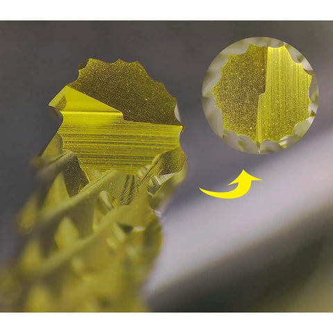 Close-up view of 2.0mm TiN Coated Solid Carbide End Mills Set For PCB Engraving And CNC Routing, tipped cutting edge.