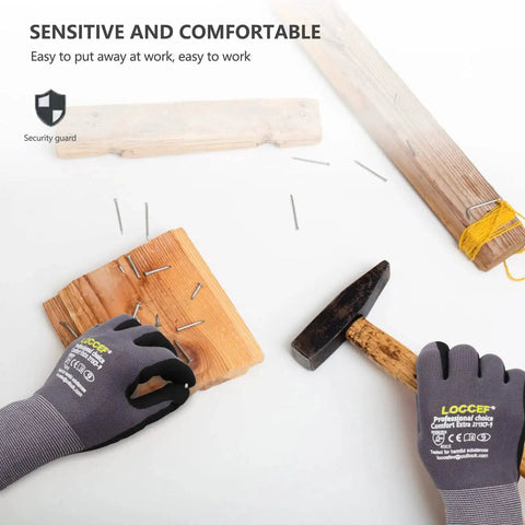 MicroFoam Nitrile Coated Work Gloves 6 Pairs Seamless Knit Nylon Gray 9 Large in use while hammering nails into wood