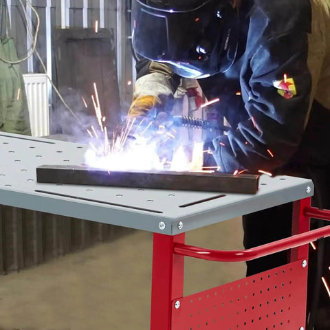 Movable Welding Table 36 By 18 Inch Heavy Duty Steel Workbench With 1200 Lbs Total Load Capacity in use for welding