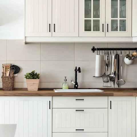 Modern kitchen with 30 Pack 4 Inch Square Kitchen Cabinet Handles Matte Black Drawer Pulls installed on white cabinets